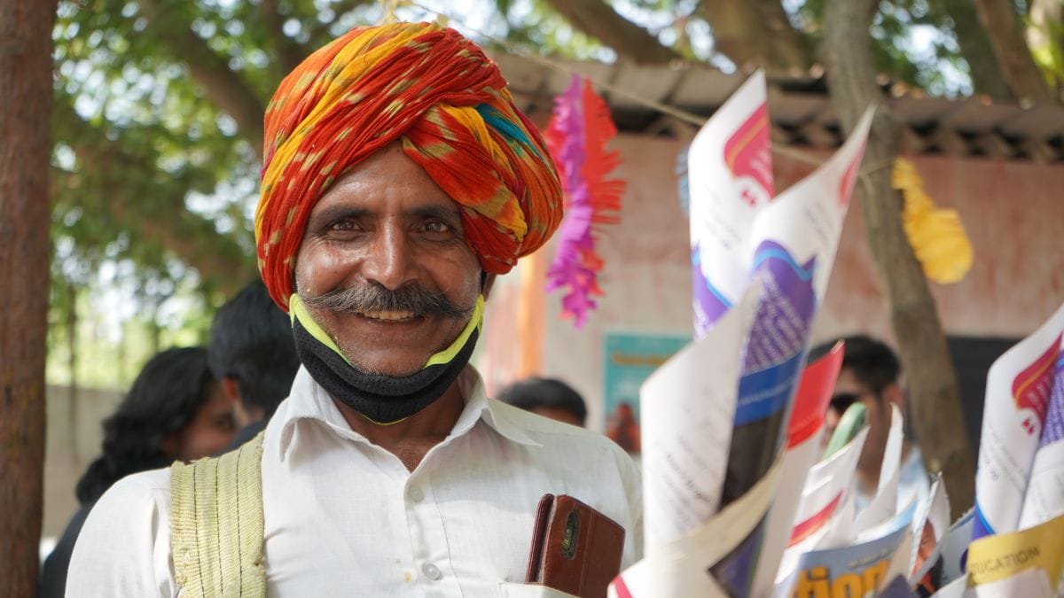 Why Rajasthani old people traditionally wear colorful turbans?